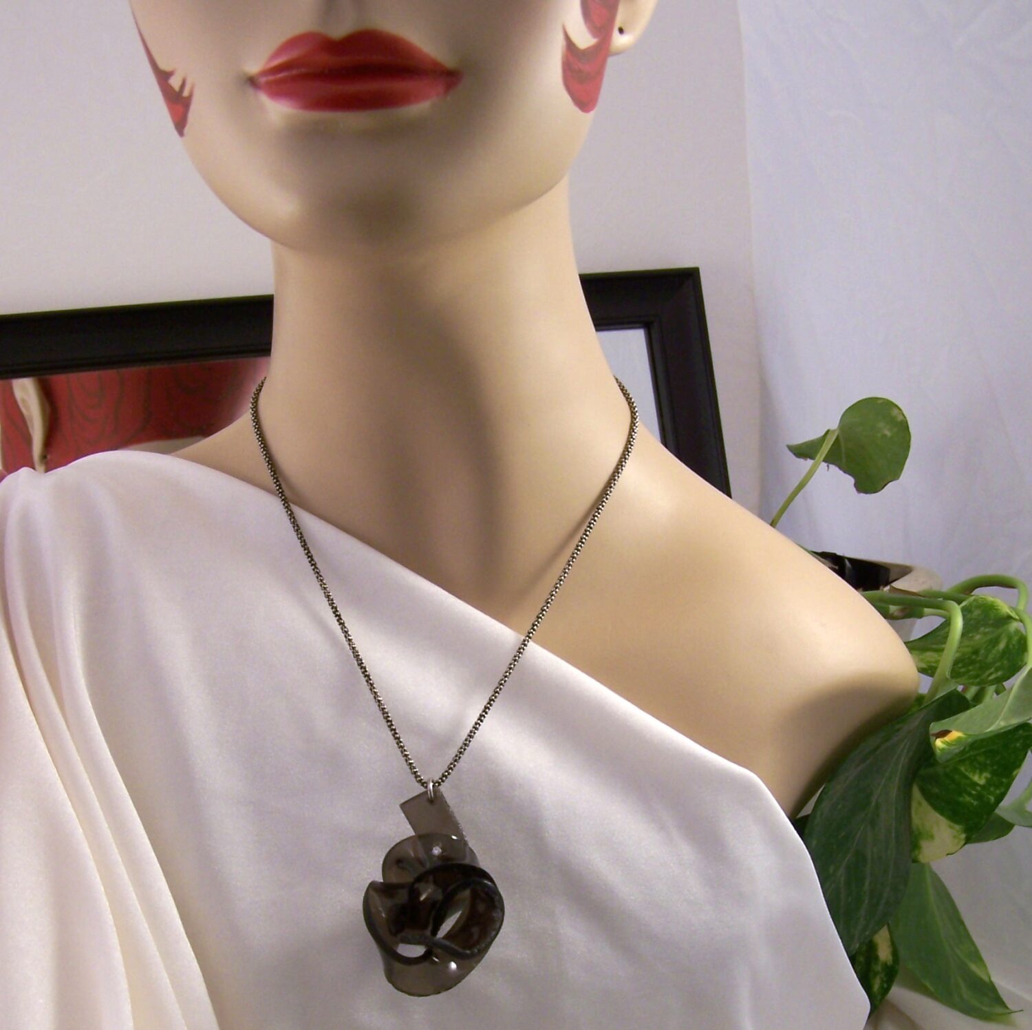 All Tied Up In Knots Pendant with chain by Holly J Carter