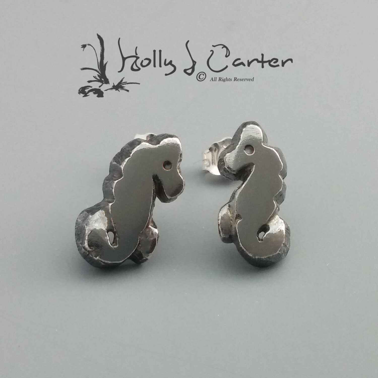 Seahorse Sterling Silver Stud Earrings handcrafted by metals artist Holly J Carter.