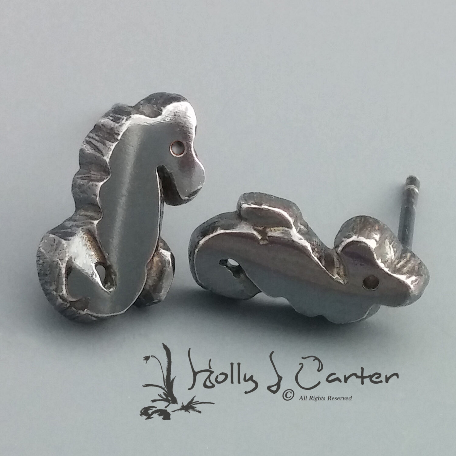 Seahorse Sterling Silver Stud Earrings handcrafted by metals artist Holly J Carter.