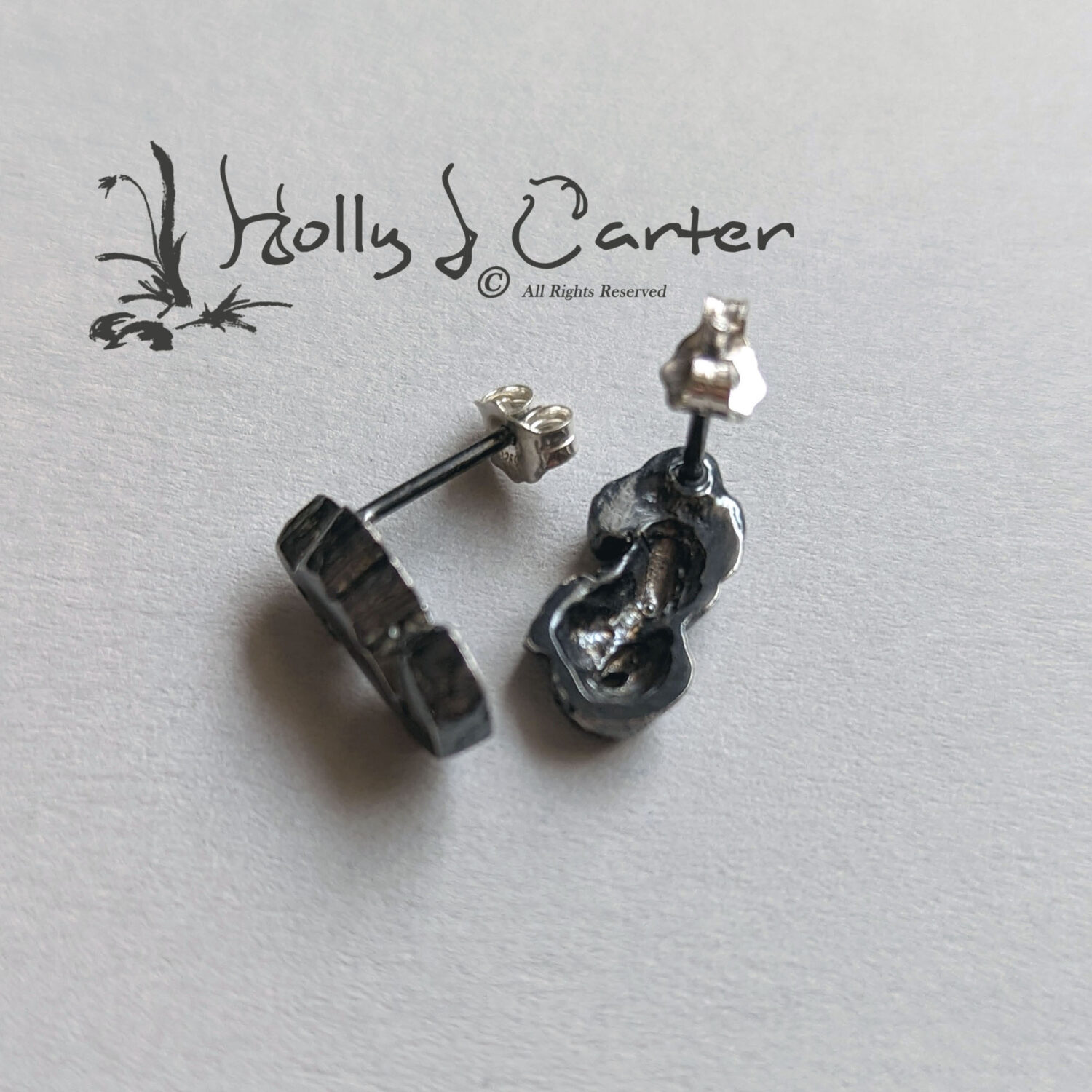Seahorse Sterling Silver Stud Earrings handcrafted by metals artist Holly J Carter.